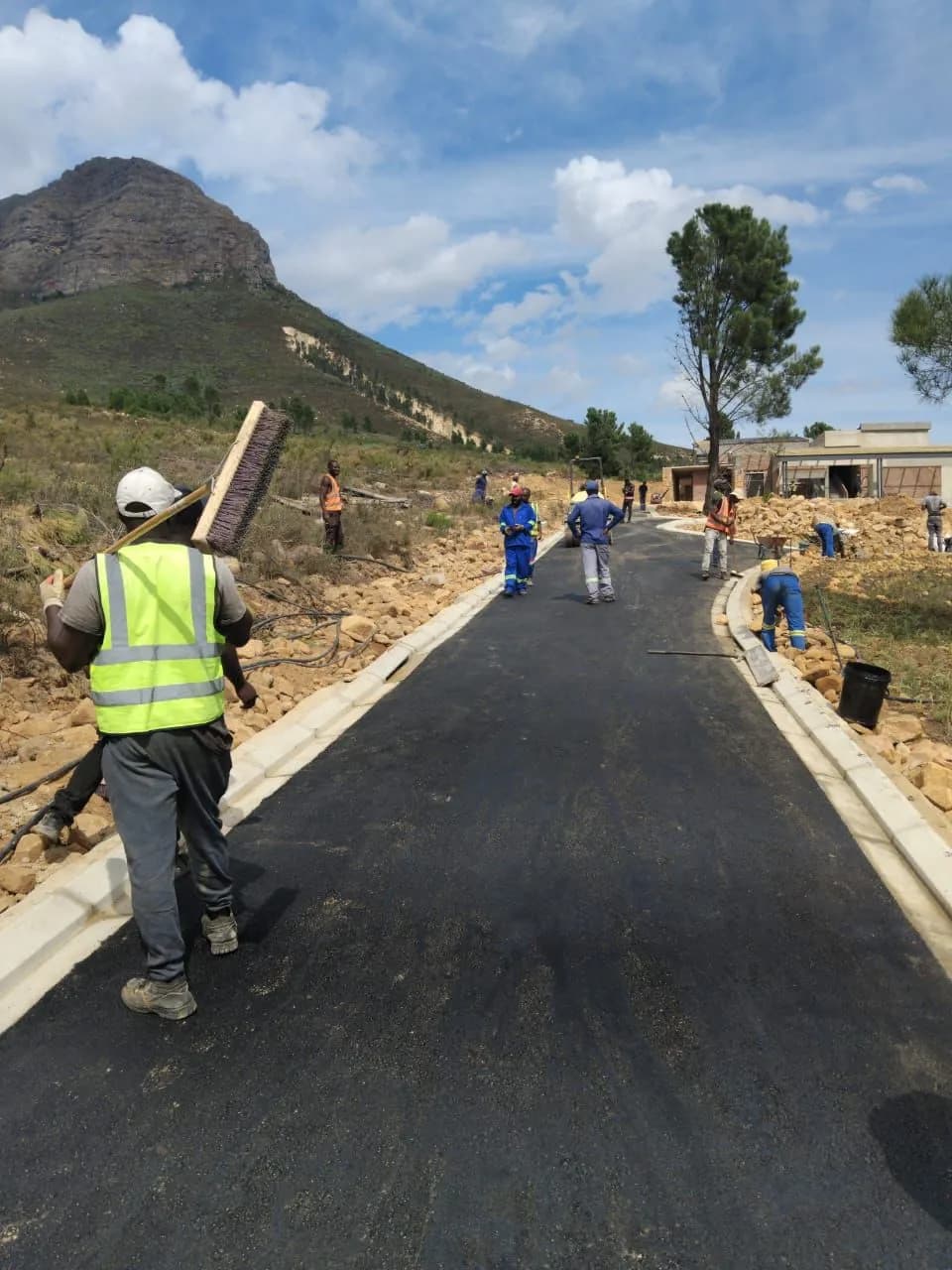 Road construction in a hillside residential area