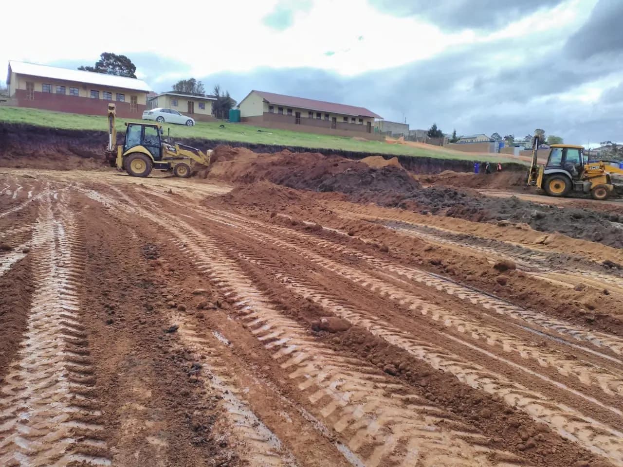 Excavator and heavy machinery on earthworks