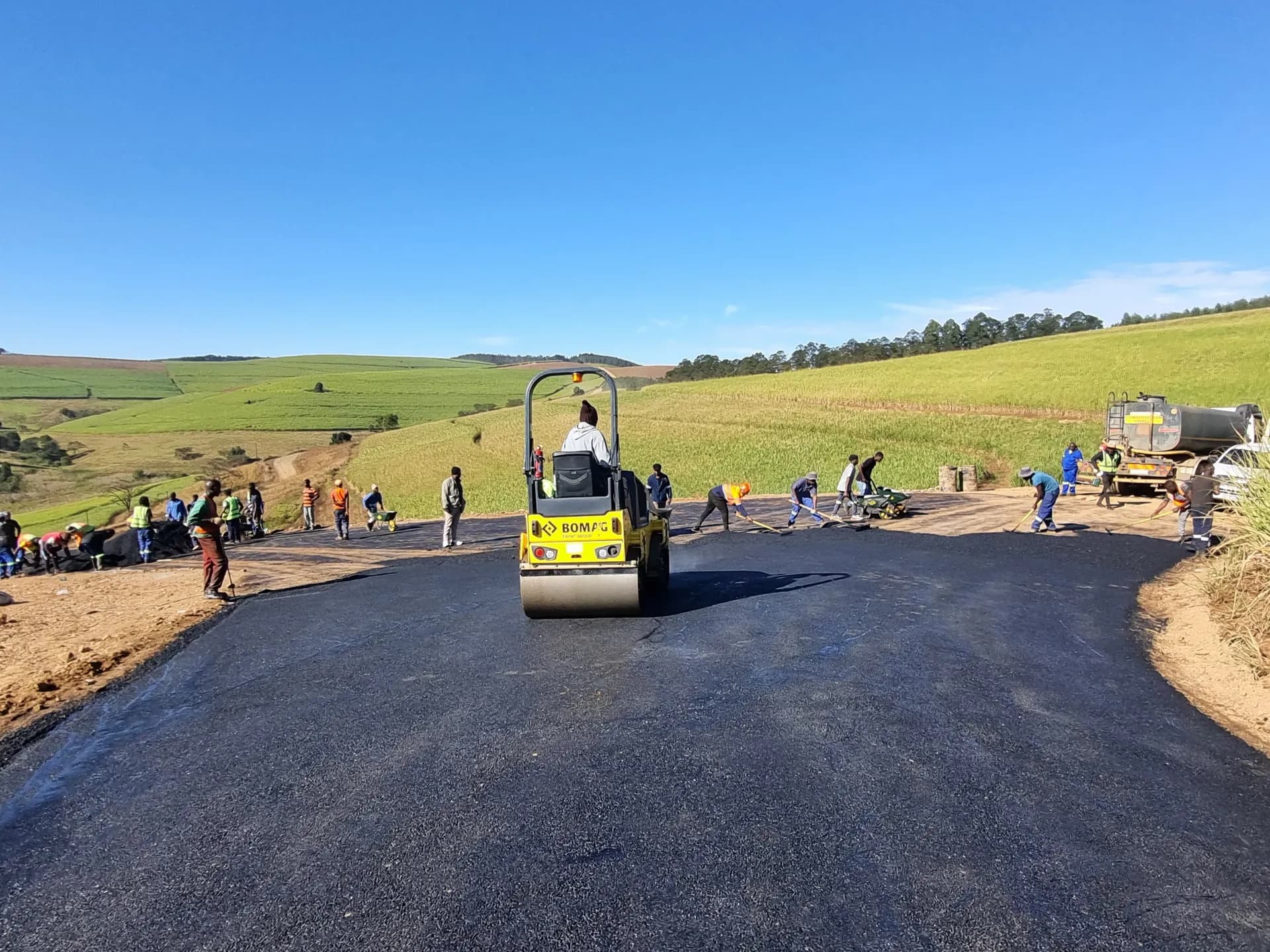 Dongo Civils crew surfacing a rural access road